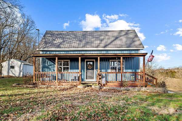 30.6 Acres of Agricultural Land with Home for Sale in Buffalo, Missouri