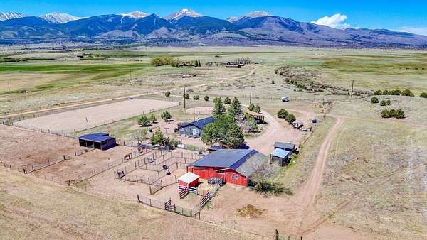 35 Acres of Agricultural Land with Home for Sale in Cotopaxi, Colorado