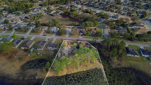 0.9 Acres of Residential Land for Sale in Deltona, Florida