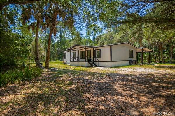 2 Acres of Land with Home for Sale in Inglis, Florida