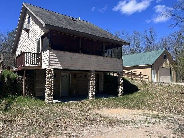 5.42 Acres of Land with Home for Sale in Manistee, Michigan