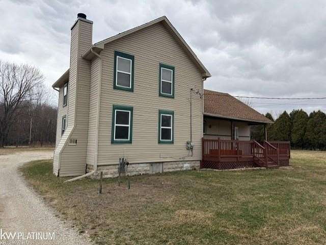 8 Acres of Land with Home for Sale in Cottrellville Township, Michigan