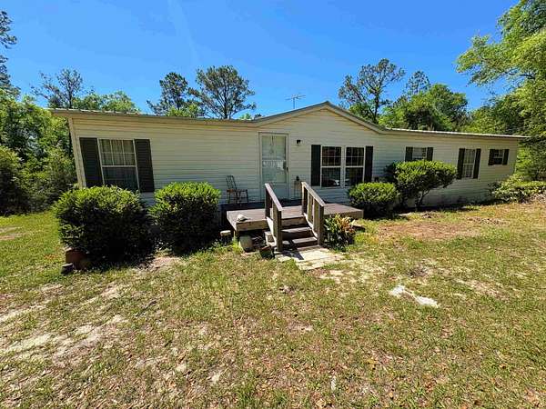 4.64 Acres of Land with Home for Sale in Chattahoochee, Florida