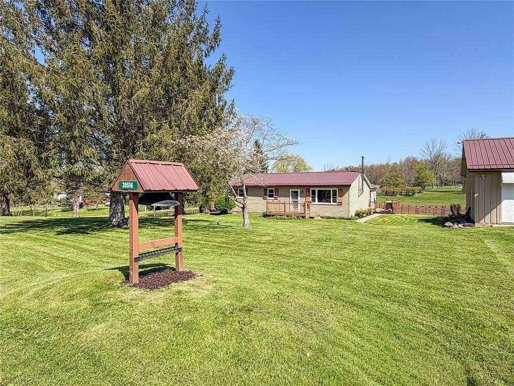 15.1 Acres of Land with Home for Sale in Cambridge Springs, Pennsylvania