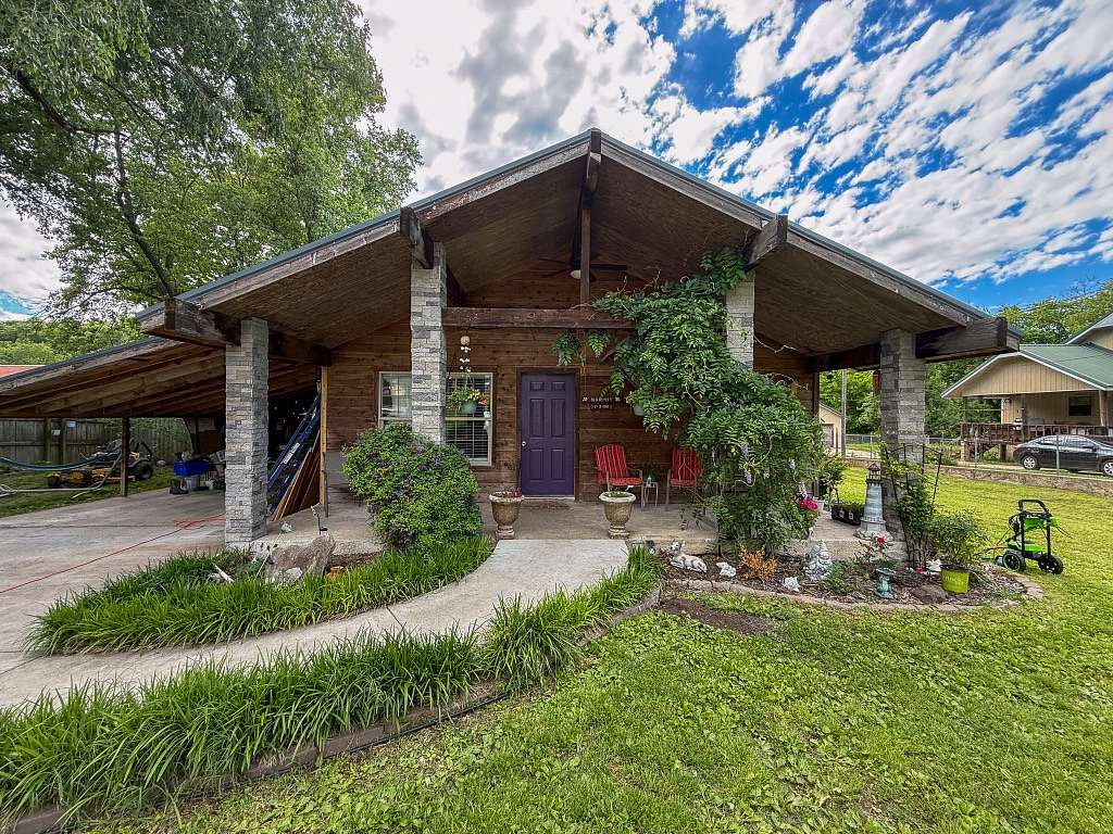 0.32 Acres of Land with Home for Sale in Anderson, Missouri