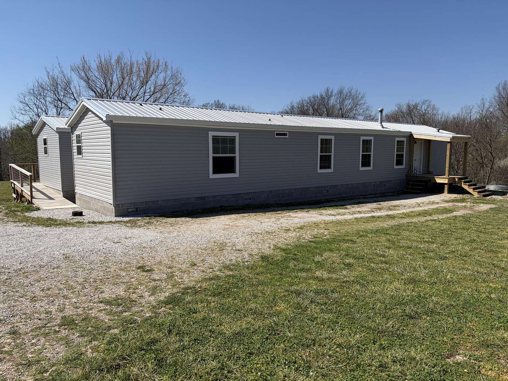 5.78 Acres of Land with Home for Sale in Rocky Comfort, Missouri
