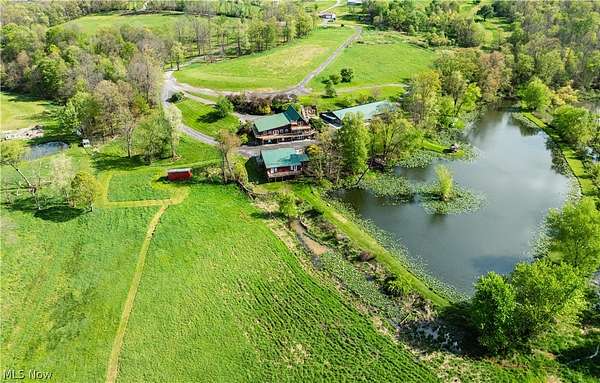 9.4 Acres of Land with Home for Auction in Dundee, Ohio