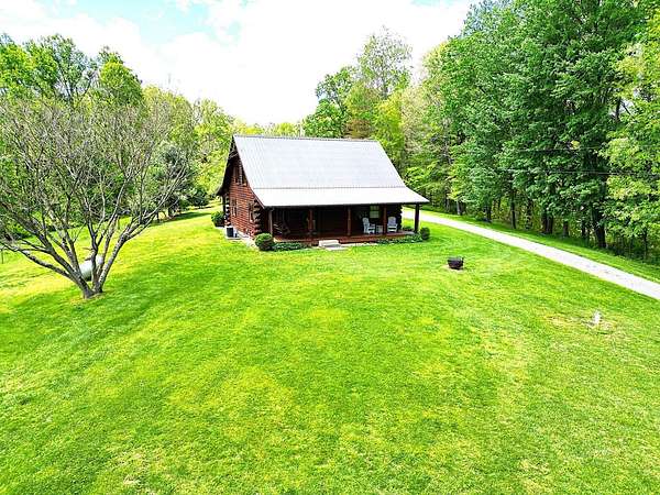 16.2 Acres of Land with Home for Sale in McArthur, Ohio
