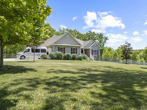 6.78 Acres of Land with Home for Sale in Soddy-Daisy, Tennessee