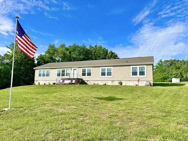 20 Acres of Land with Home for Sale in Humansville, Missouri