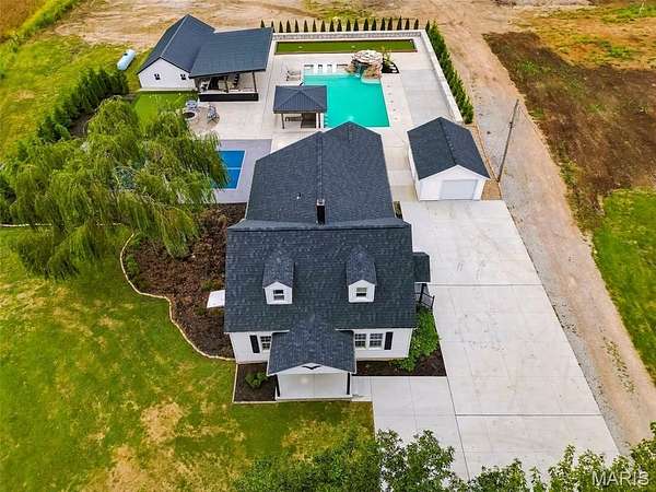 21.6 Acres of Agricultural Land with Home for Sale in Wright City, Missouri