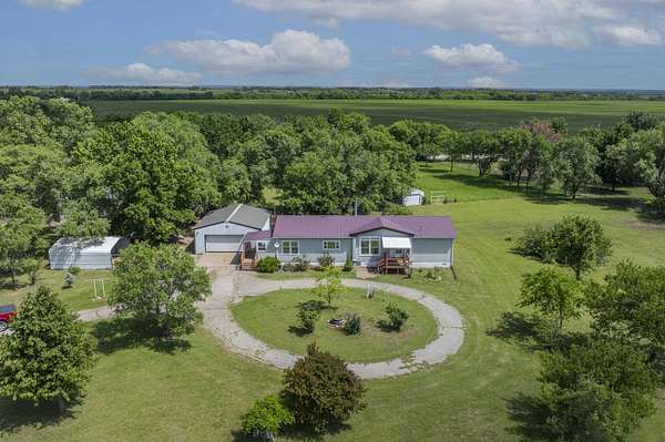 4.8 Acres of Land with Home for Sale in Arkansas City, Kansas