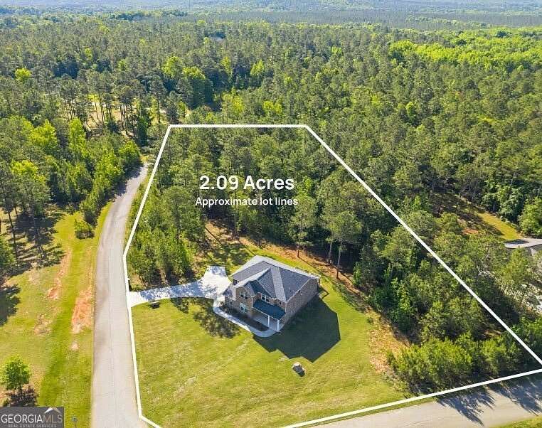 2 Acres of Land with Home for Sale in Haddock, Georgia
