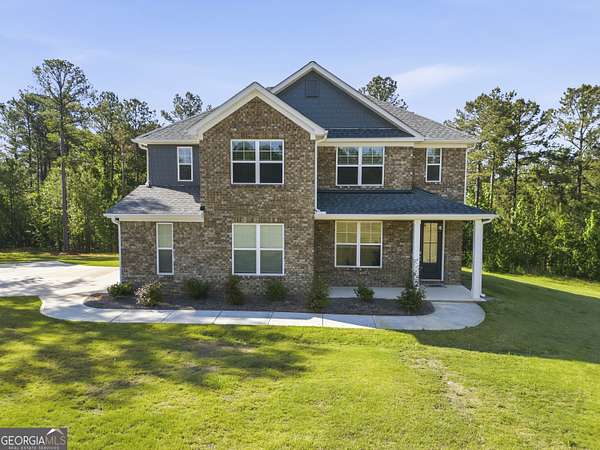 2 Acres of Land with Home for Sale in Haddock, Georgia