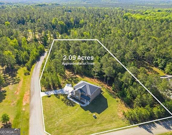 2 Acres of Land with Home for Sale in Haddock, Georgia