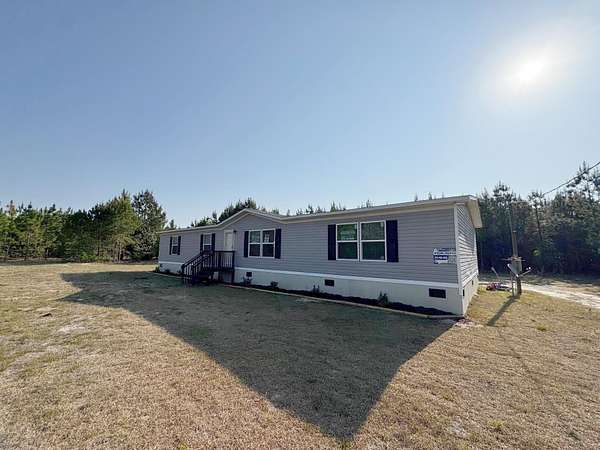 21 Acres of Recreational Land with Home for Sale in Wagener, South Carolina