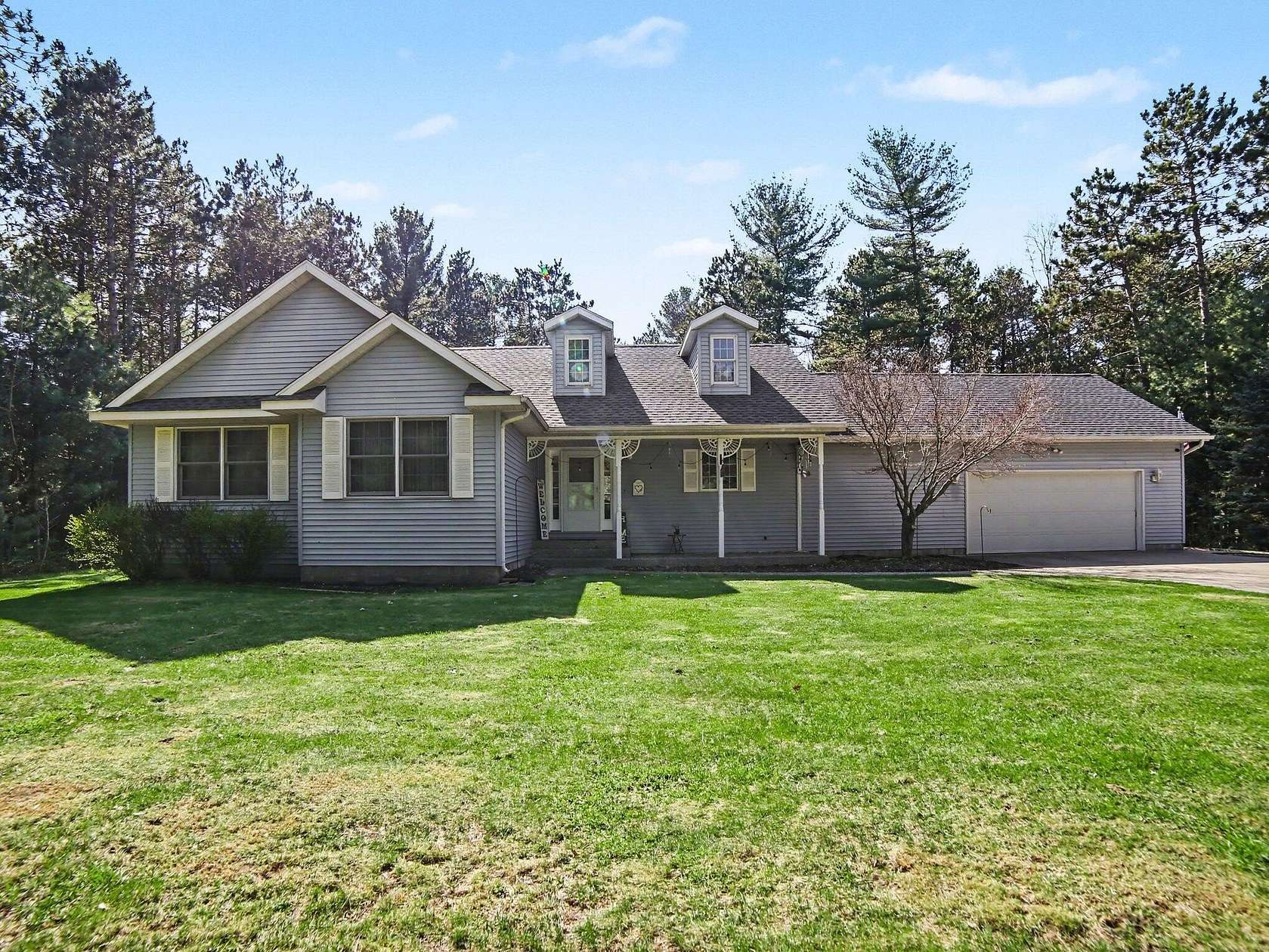 1.77 Acres of Land with Home for Sale in Whitehall, Michigan