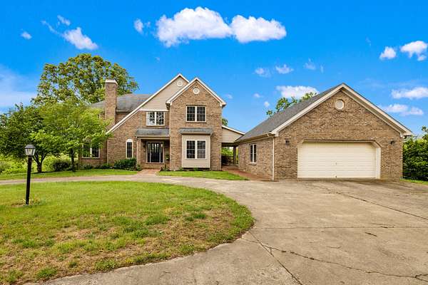80 Acres of Land with Home for Sale in Versailles, Kentucky