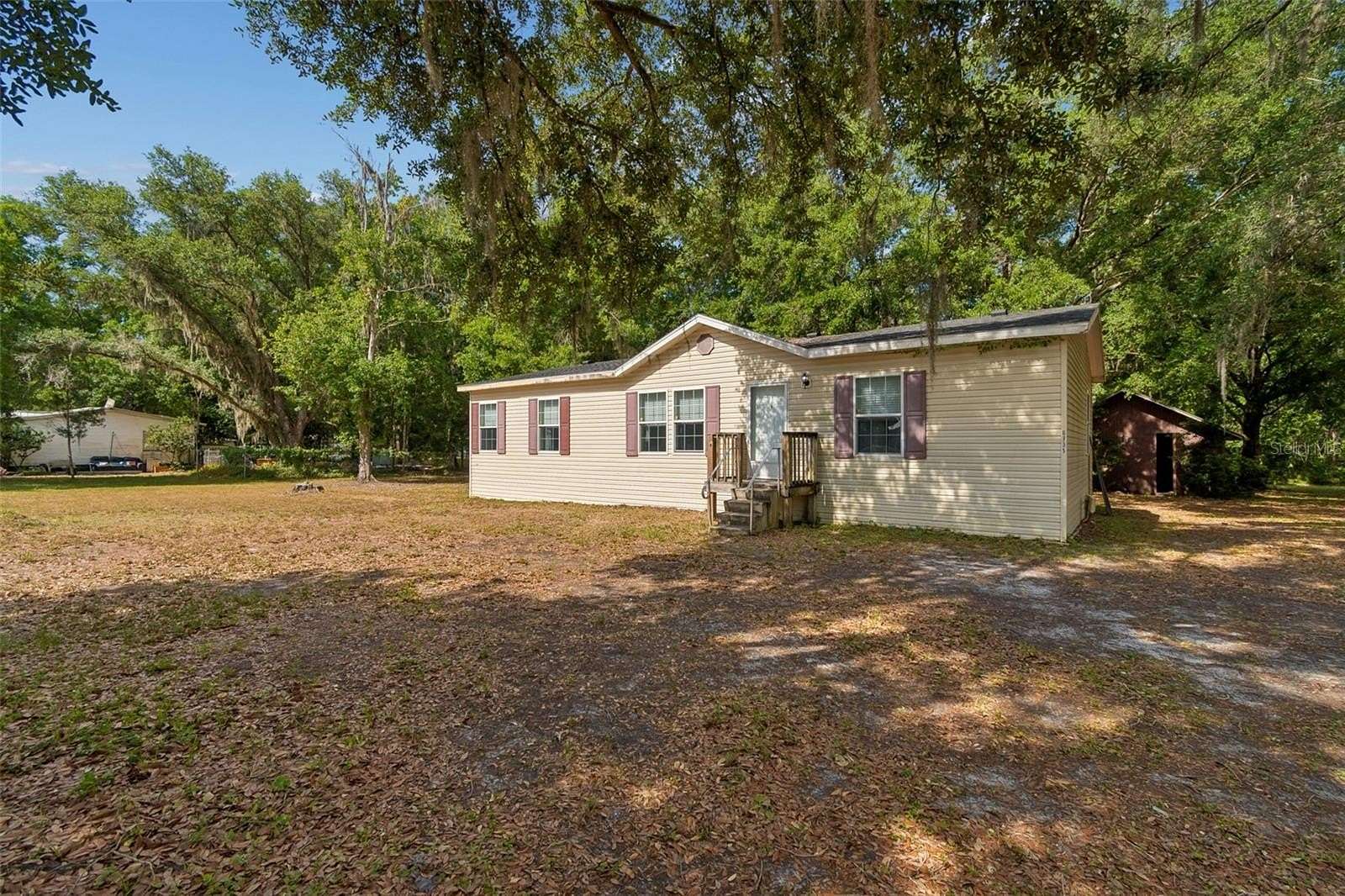 1.72 Acres of Land with Home for Sale in Wesley Chapel, Florida
