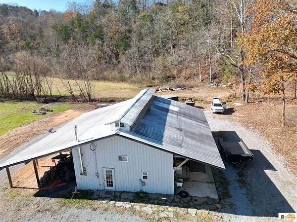56.3 Acres of Recreational Land with Home for Sale in Columbia, Kentucky
