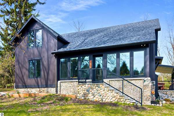 37.5 Acres of Agricultural Land with Home for Sale in Suttons Bay, Michigan