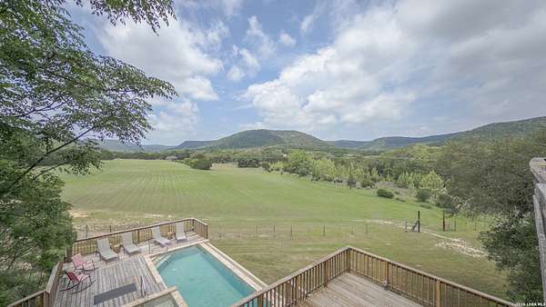 15.3 Acres of Recreational Land with Home for Sale in Medina, Texas