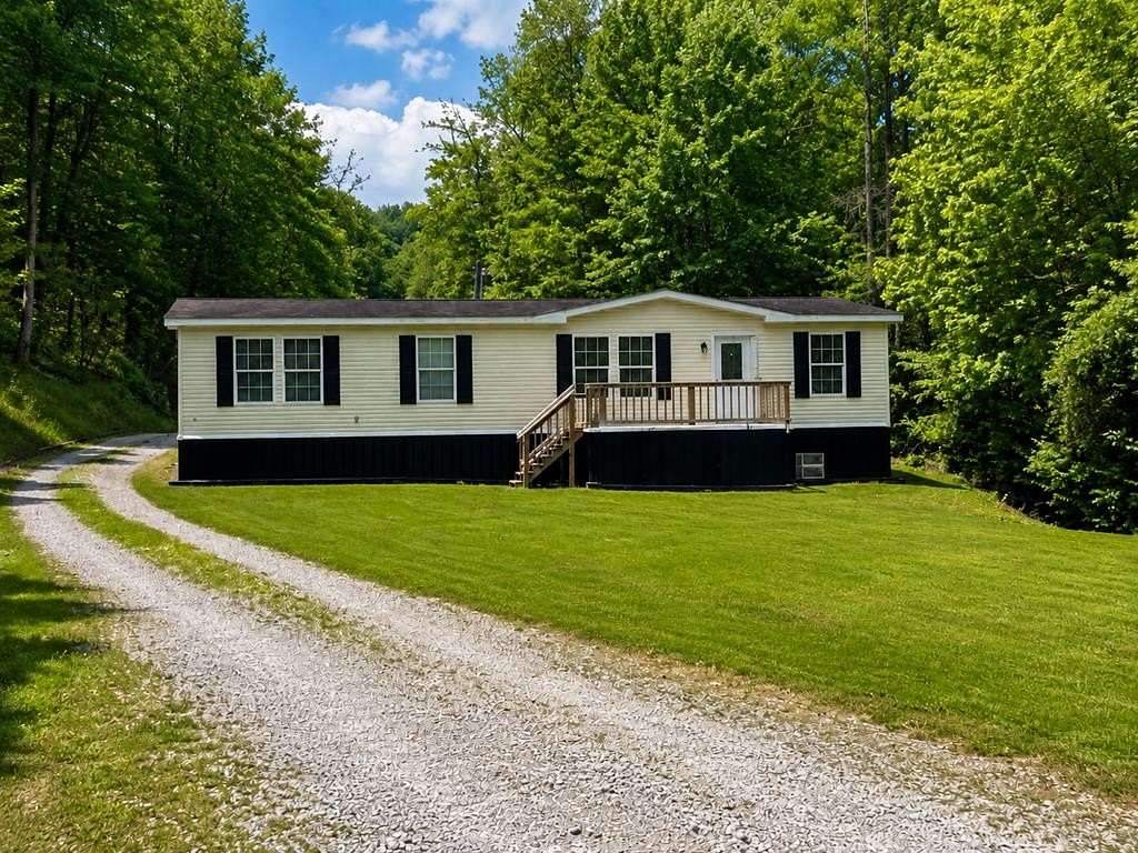3 Acres of Land with Home for Sale in Oil Springs, Kentucky