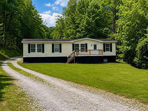 3 Acres of Land with Home for Sale in Oil Springs, Kentucky