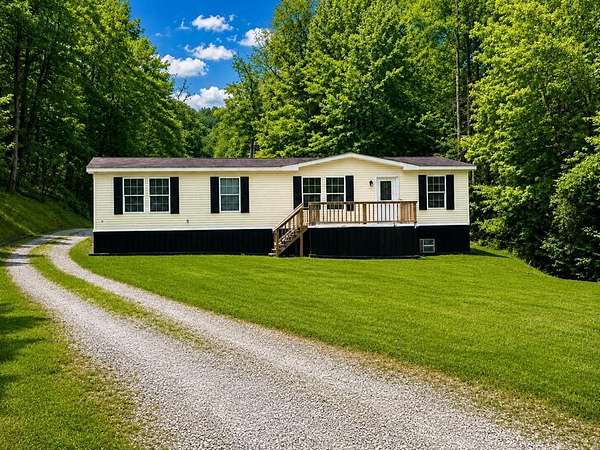 3 Acres of Land with Home for Sale in Oil Springs, Kentucky
