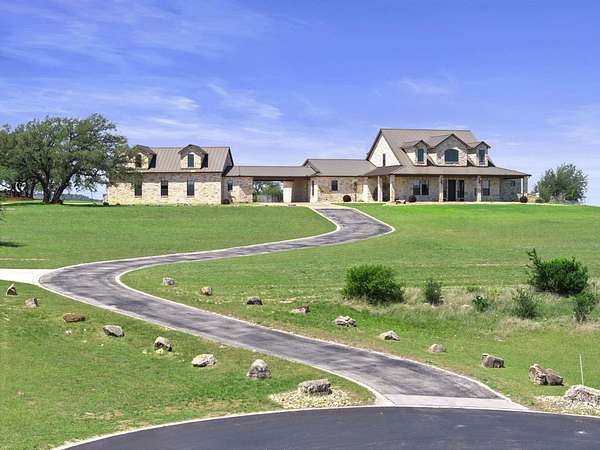 11.3 Acres of Land with Home for Sale in Round Mountain, Texas