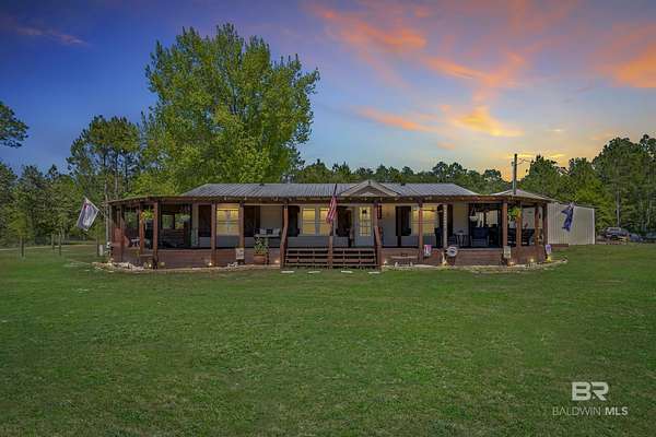 27 Acres of Land with Home for Sale in Lillian, Alabama