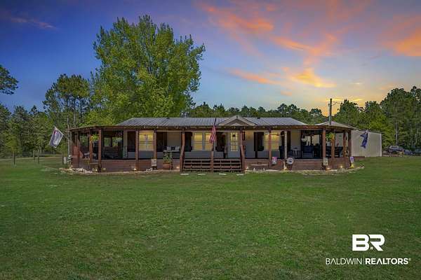 27 Acres of Land with Home for Sale in Lillian, Alabama