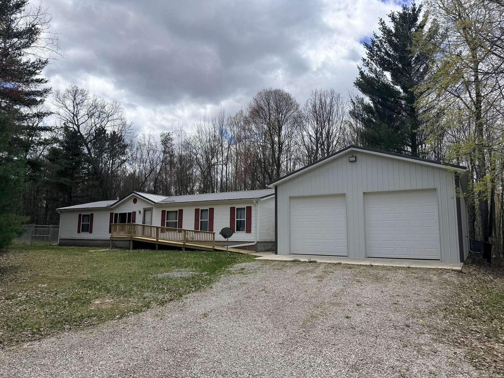 19.4 Acres of Recreational Land with Home for Sale in Luther, Michigan