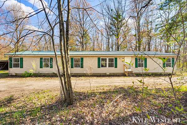 4.75 Acres of Land with Home for Sale in Holton, Michigan