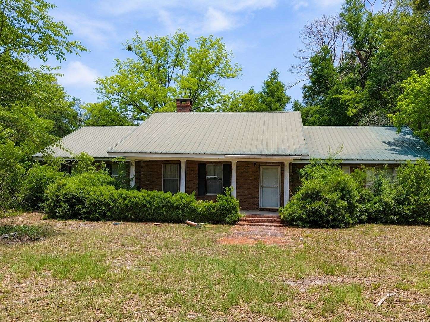 2.86 Acres of Land with Home for Sale in McAlpin, Florida