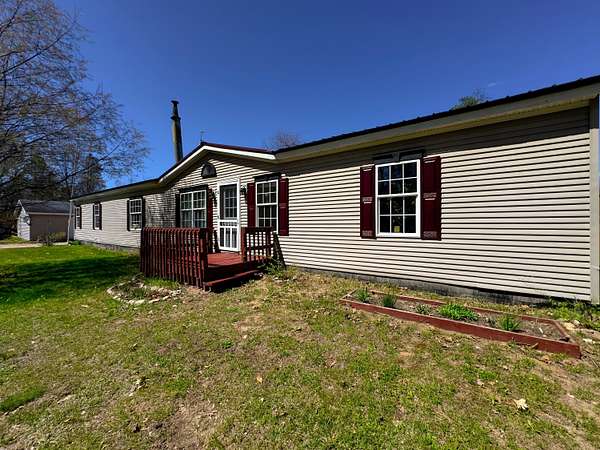 5.35 Acres of Land with Home for Sale in Luther, Michigan