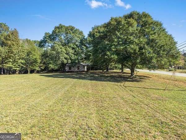 1.76 Acres of Land with Home for Sale in Commerce, Georgia