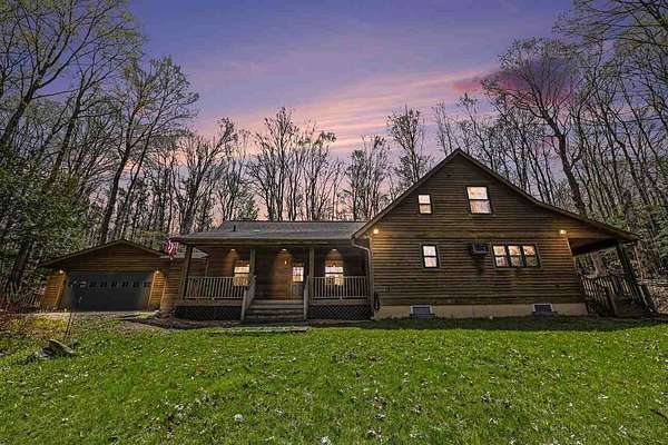 5 Acres of Land with Home for Sale in Charlevoix, Michigan