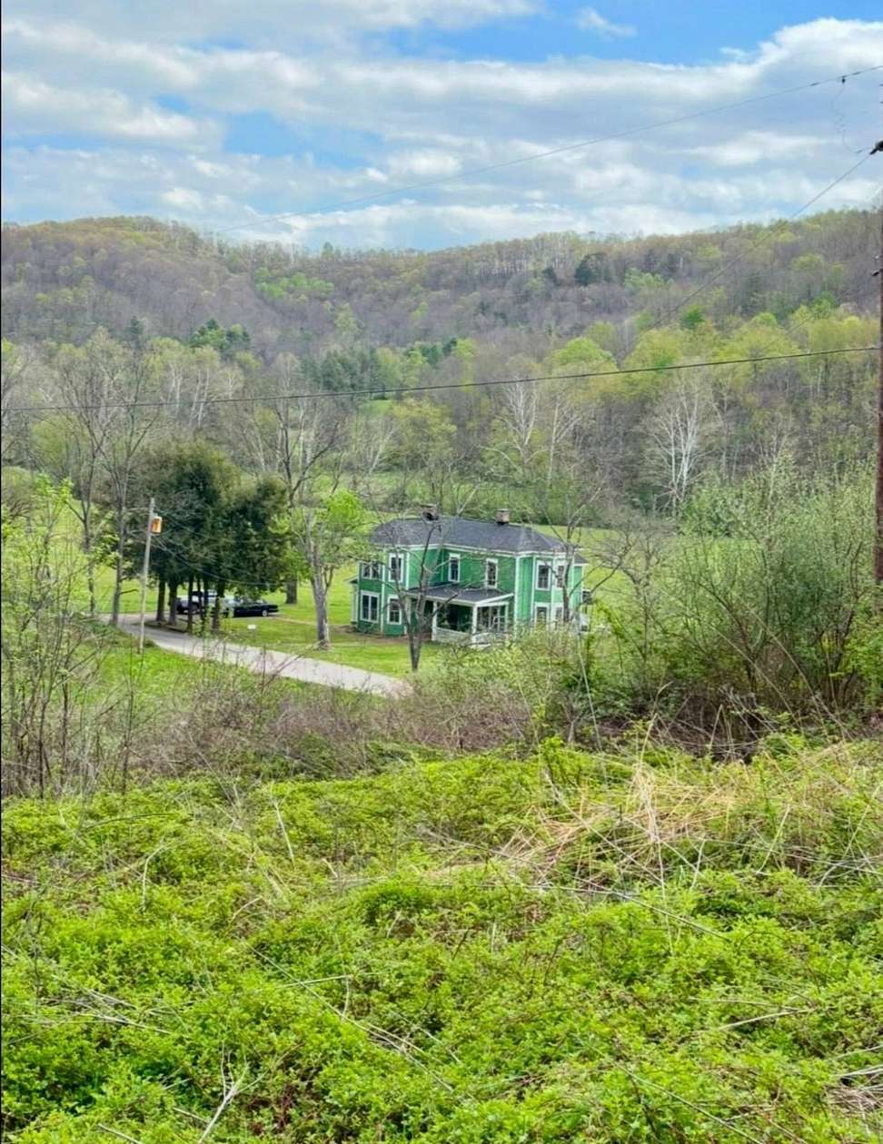 211 Acres of Land with Home for Sale in Spencer, West Virginia
