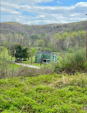 211 Acres of Land with Home for Sale in Spencer, West Virginia