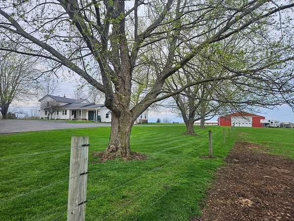 9.7 Acres of Land with Home for Auction in Le Roy, New York
