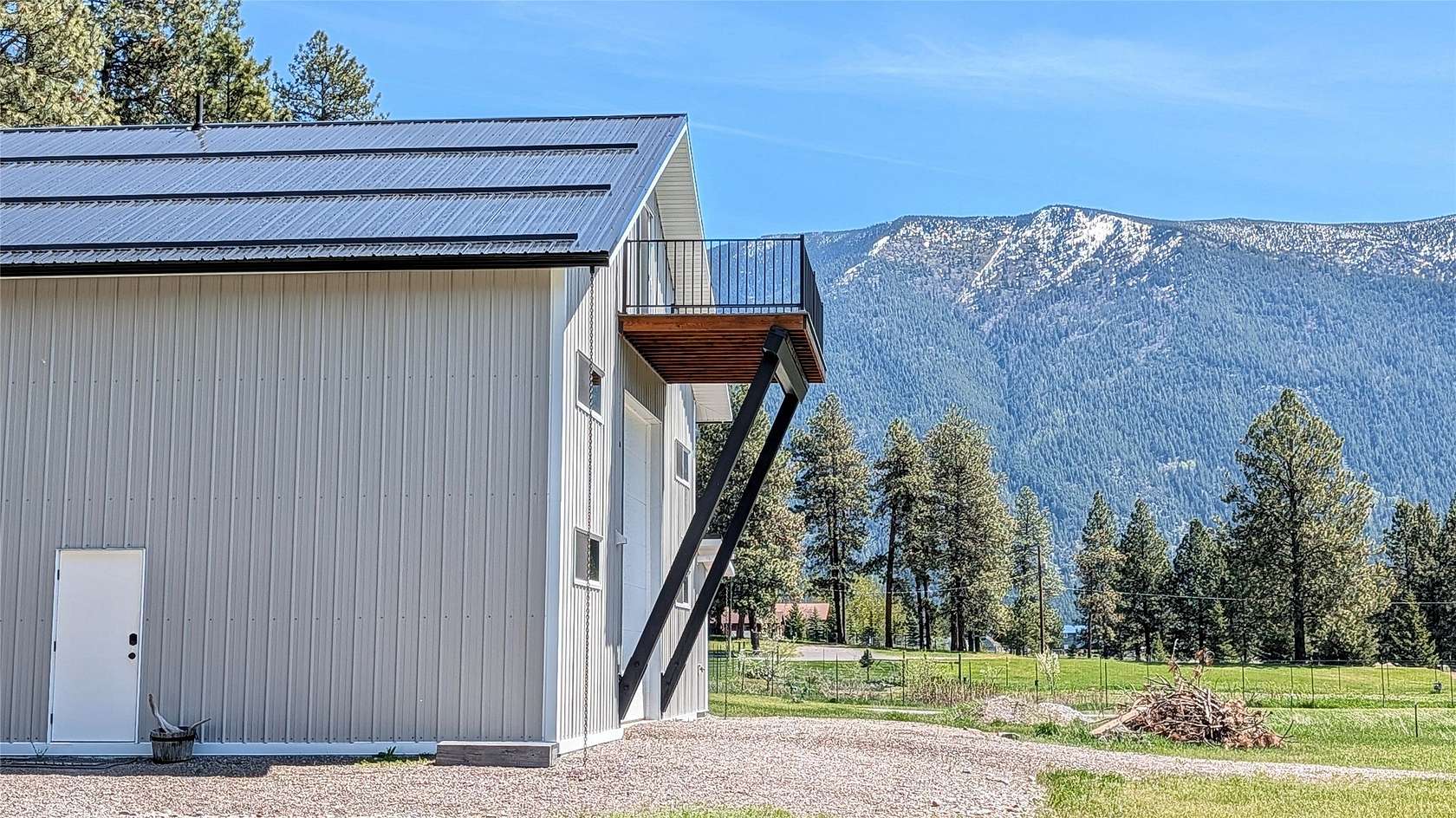 5 Acres of Land with Home for Sale in Columbia Falls, Montana
