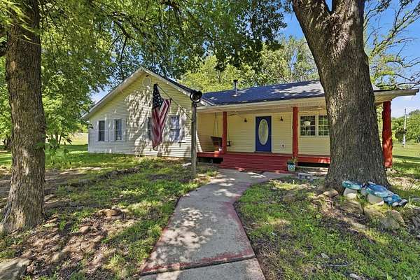 32.5 Acres of Agricultural Land with Home for Sale in Aldrich, Missouri