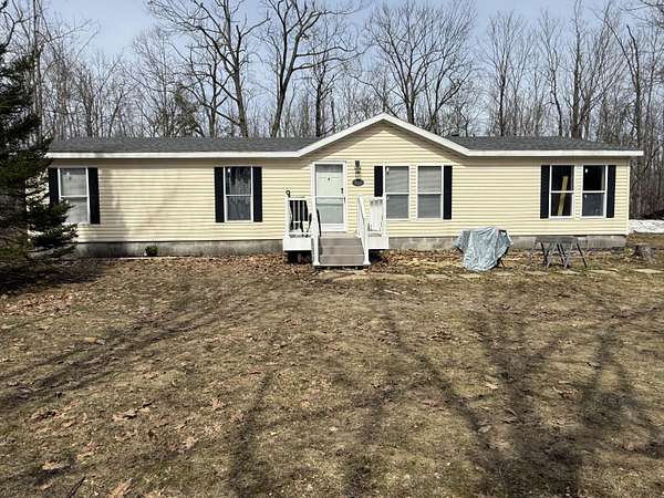10 Acres of Land with Home for Sale in Cheboygan, Michigan