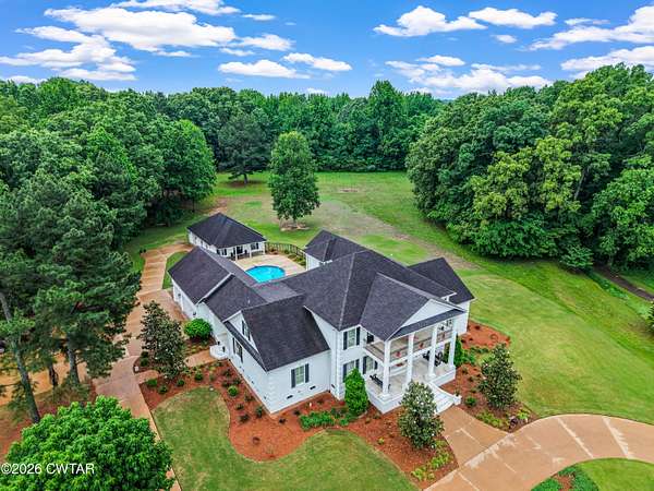 9.8 Acres of Land with Home for Sale in Humboldt, Tennessee