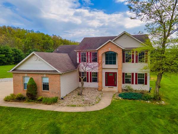 11.8 Acres of Land with Home for Sale in Edwardsburg, Michigan