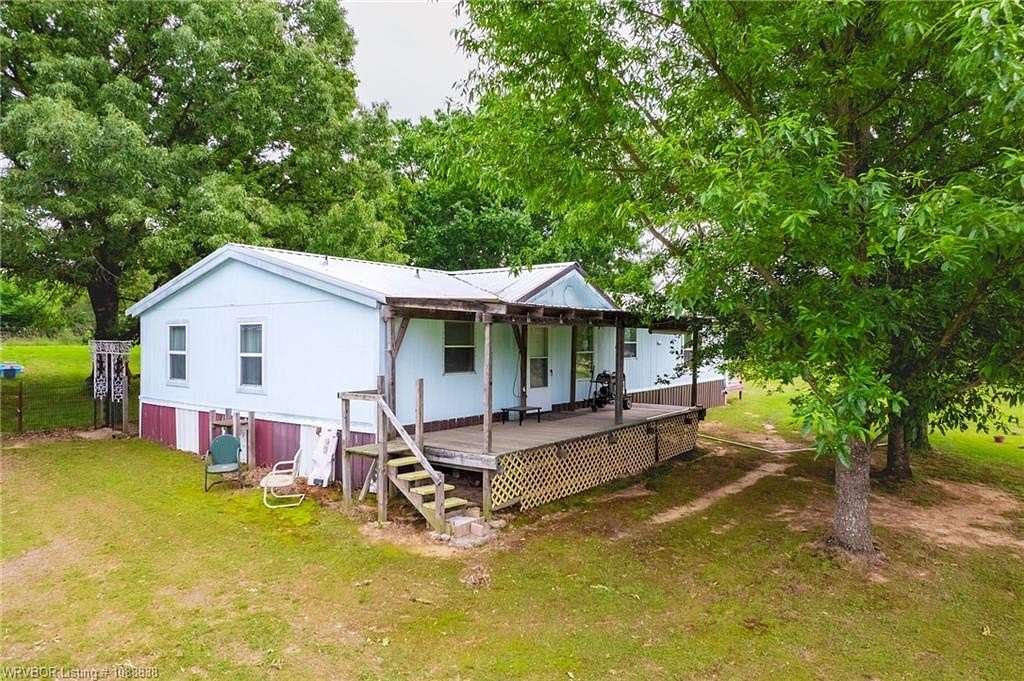 7 Acres of Land with Home for Sale in Muldrow, Oklahoma