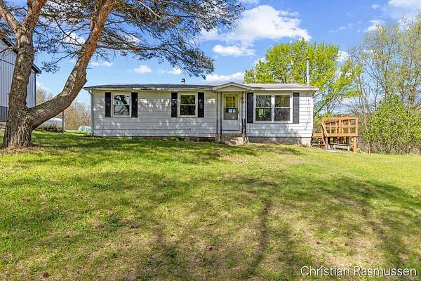 10 Acres of Land with Home for Sale in Stanton, Michigan