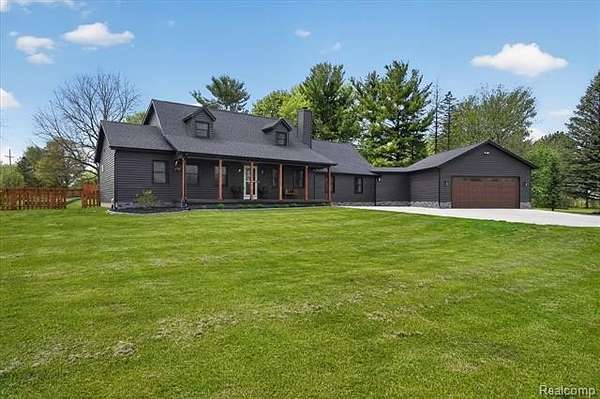 2.65 Acres of Land with Home for Sale in Handy Township, Michigan