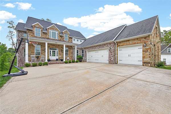 2.65 Acres of Land with Home for Sale in Centerton, Arkansas